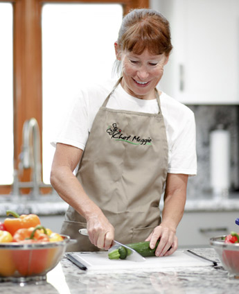Tucson Personal Chef Maggie preparing a meal for a family